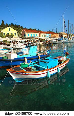 Stock Image - "Boats in the harbour, Fiscardo Kefalonia, Greece, Europe". Fotosearch