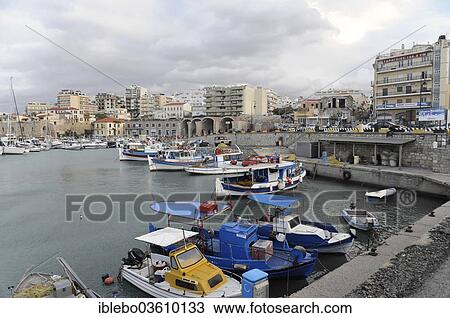 Stock Image - "Boats in the Venetian harbour, Heraklion, Crete, Greece, Europe". Fotosearch