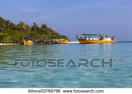 Stock Photograph - "Boats off Embudu island, South Male Atoll, Maldives, Asia". Fotosearch