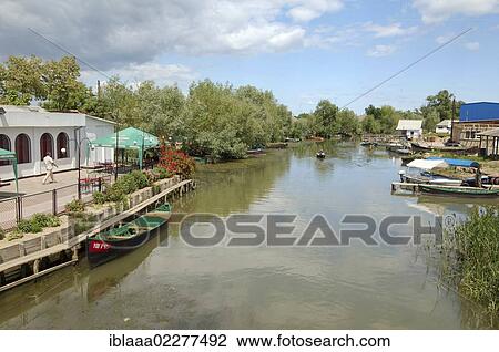 "Boats on canal in Vilkovo or Vylkove, also known as """"Ukrainian Venice"""", Ukraine, Eastern Europe, Europe" View Large Photo Image Stock Image - "Boats on canal in Vilkovo or Vylkove, also known as """"Ukrainian Venice"""", Ukraine, Eastern Europe, Europe". Fotosearch