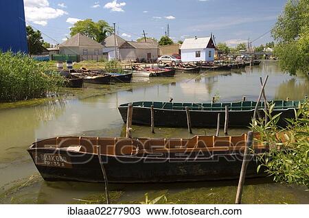 "Boats on canal in Vilkovo or Vylkove, also known as """"Ukrainian Venice"""", Ukraine, Eastern Europe, Europe" View Large Photo Image Stock Image - "Boats on canal in Vilkovo or Vylkove, also known as """"Ukrainian Venice"""", Ukraine, Eastern Europe, Europe". Fotosearch
