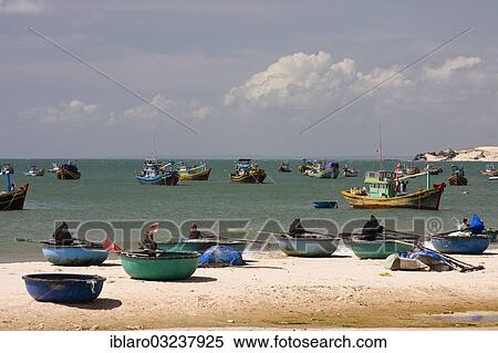 "Boats on the beach and on the sea, at a fishing village, Hai Dang Ker Ka, Vietnam, Asia" View Large Photo Image Stock Photography - "Boats on the beach and on the sea, at a fishing village, Hai Dang Ker Ka, Vietnam, Asia". Fotosearch