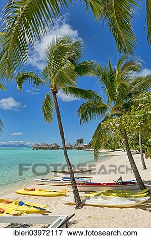 Stock Photo - "Boats on the beach of Matira, Bora Bora, French Polynesia, Oceania". Fotosearch