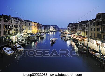 "Boats on the Grand Canal, Canal Grande, from Rialto Bridge, Palazzo Dolfin Manin, Palazzo Barbarigo, at night, Venice, Venezia, Veneto, Italy, Europe" View Large Photo Image Stock Photo - "Boats on the Grand Canal, Canal Grande, from Rialto Bridge, Palazzo Dolfin Manin, Palazzo Barbarigo, at night, Venice, Venezia, Veneto, Italy, Europe". Fotosearch