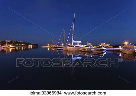 "Boats reflected in the water at night, Baska Voda, Makarska Riviera, Adriatic coast, Adriatic Sea, Dalmatia, Croatia, Europe" View Large Photo Image Picture - "Boats reflected in the water at night, Baska Voda, Makarska Riviera, Adriatic coast, Adriatic Sea, Dalmatia, Croatia, Europe". Fotosearch
