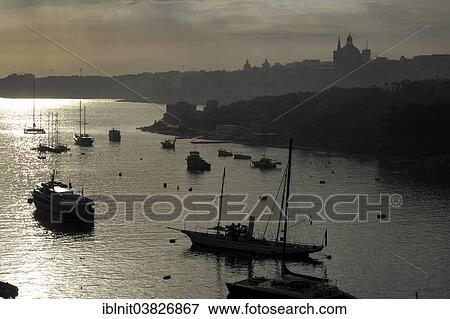 "Boats with backlighting, Sliema Creek, Valletta, Malta, Europe" View Large Photo Image Stock Photo - "Boats with backlighting, Sliema Creek, Valletta, Malta, Europe". Fotosearch