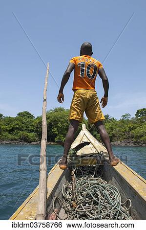 "Boatsman looking for a suitable place to dock, Banana Islands, Western Area, Sierra Leone, Africa" View Large Photo Image Stock Photograph - "Boatsman looking for a suitable place to dock, Banana Islands, Western Area, Sierra Leone, Africa". Fotosearch