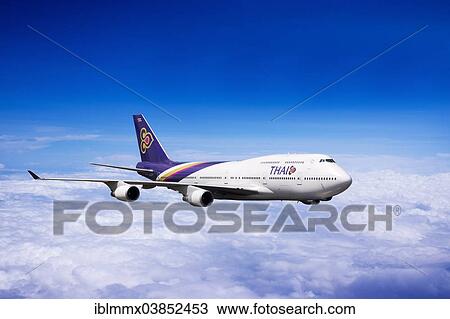 Boeing 747 from Thai Airways in flight View Large Photo Image Stock Image - Boeing 747 from Thai Airways in flight. Fotosearch