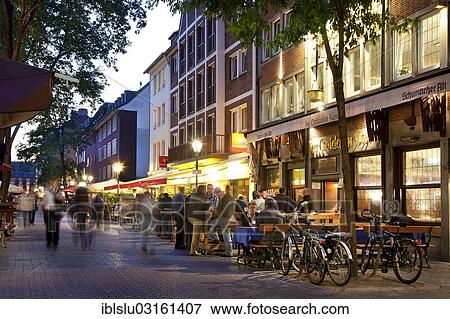 "Bolkerstrasse street with restaurants, old town at dusk, Dusseldorf, Rhineland, North Rhine-Westphalia, Germany, Europe" View Large Photo Image Stock Photo - "Bolkerstrasse street with restaurants, old town at dusk, Dusseldorf, Rhineland, North Rhine-Westphalia, Germany, Europe". Fotosearch