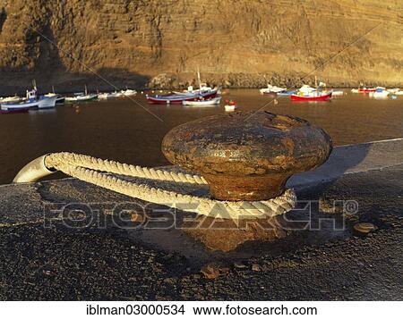 Picture - "Bollard, fishing harbour in Vueltas, Valle Gran Rey valley, La Gomera, Valle Gran Rey, Canary Islands, Spain, Europe". Fotosearch