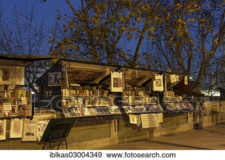 "Book stalls on the banks of the Seine, booksellers, Quai de la Tournelle, evening mood, 5th arrondissement, Paris, Ile-de-France, France, Europe" View Large Photo Image Stock Photo - "Book stalls on the banks of the Seine, booksellers, Quai de la Tournelle, evening mood, 5th arrondissement, Paris, Ile-de-France, France, Europe". Fotosearch