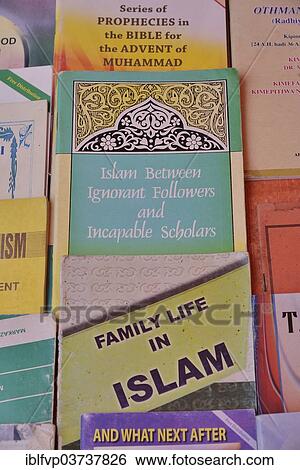 Stock Photograph - "Books about Islam at a sales stall, Stone Town, Zanzibar City, Zanzibar, Tanzania, Africa". Fotosearch