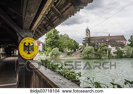 "Border sign on the longest covered wooden bridge in Europe, Rhine River, St. Fridolin's Minster at the rear, Bad Sackingen, Baden-Wurttemberg, Germany, Europe" View Large Photo Image Picture - "Border sign on the longest covered wooden bridge in Europe, Rhine River, St. Fridolin's Minster at the rear, Bad Sackingen, Baden-Wurttemberg, Germany, Europe". Fotosearch