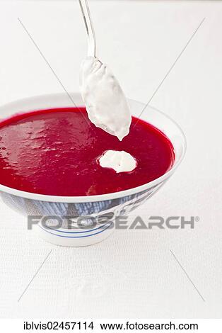 "Borscht, traditional Russian beetroot soup, served chilled with sourcream topping" View Large Photo Image Picture - "Borscht, traditional Russian beetroot soup, served chilled with sourcream topping". Fotosearch