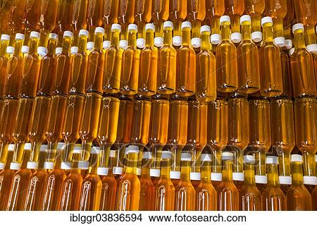 Picture - "Bottles of apple cider in a wine cellar, Ulvik, Hardangerfjord, Hordaland, Norway, Europe". Fotosearch
