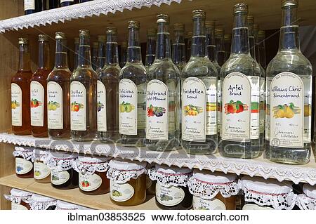 "Bottles of fruit brandy, apple market, Bad Feilnbach, Upper Bavaria, Bavaria, Germany, Europe" View Large Photo Image Stock Photography - "Bottles of fruit brandy, apple market, Bad Feilnbach, Upper Bavaria, Bavaria, Germany, Europe". Fotosearch