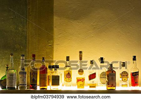 "Bottles of spirits on bar shelf, Florence, Italy, Europe" View Large Photo Image Stock Photo - "Bottles of spirits on bar shelf, Florence, Italy, Europe". Fotosearch