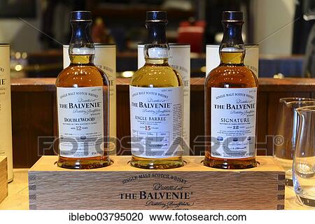 Stock Image - "Bottles of whiskey, Glenfiddich Whisky Distillery, Dufftown, Scotland, United Kingdom, Europe". Fotosearch