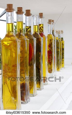"Bottles with olive oil and herbs, botanical gardens of The Eden Project, St Austell, Cornwall, England, United Kingdom, Europe" View Large Photo Image Stock Image - "Bottles with olive oil and herbs, botanical gardens of The Eden Project, St Austell, Cornwall, England, United Kingdom, Europe". Fotosearch