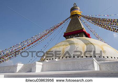Stock Photograph - "Boudhanath Stupa, with prayer flags, Kathmandu, Nepal, Asia". Fotosearch