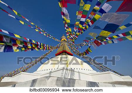 "Boudnath Stupa with prayer flags against blue sky, Kathmandu Valley, Kathmandu, Kathmandu District, Bagmati Zone, Nepal, Asia" View Large Photo Image Picture - "Boudnath Stupa with prayer flags against blue sky, Kathmandu Valley, Kathmandu, Kathmandu District, Bagmati Zone, Nepal, Asia". Fotosearch