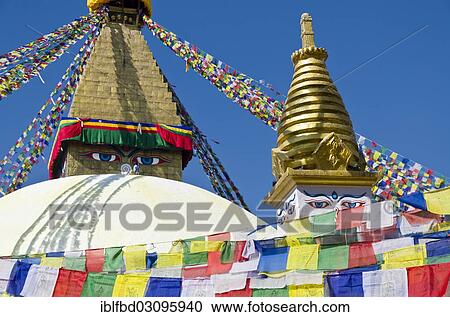 Stock Image - "Boudnath Stupa with prayer flags against blue sky, Kathmandu Valley, Kathmandu, Kathmandu District, Bagmati Zone, Nepal, Asia". Fotosearch