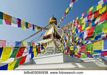 Stock Photo - "Boudnath Stupa with prayer flags against blue sky, Kathmandu Valley, Kathmandu, Kathmandu District, Bagmati Zone, Nepal, Asia". Fotosearch