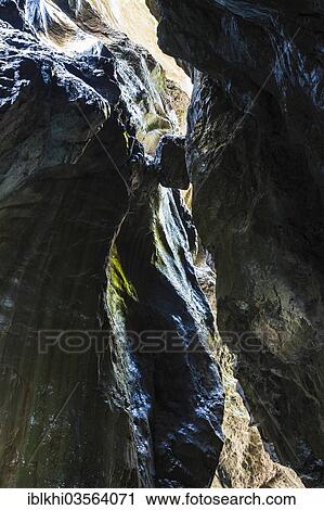 "Boulder wedged between two rock faces, Partnachklamm, Garmisch-Partenkirchen, Upper Bavaria, Bavaria, Germany, Europe" View Large Photo Image Stock Image - "Boulder wedged between two rock faces, Partnachklamm, Garmisch-Partenkirchen, Upper Bavaria, Bavaria, Germany, Europe". Fotosearch