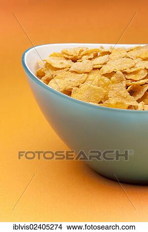 Bowl filled with corn flakes View Large Photo Image Picture - Bowl filled with corn flakes. Fotosearch