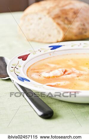 "Bowl of soup with prawns, served with bread" View Large Photo Image Stock Photography - "Bowl of soup with prawns, served with bread". Fotosearch
