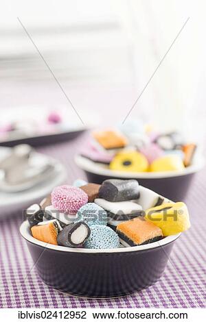 Bowls filled with liquorice candy View Large Photo Image Stock Image - Bowls filled with liquorice candy. Fotosearch
