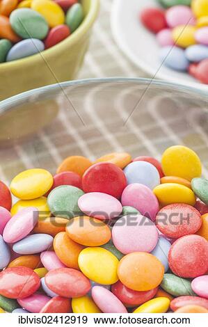 Bowls with multicolored candy View Large Photo Image Stock Photo - Bowls with multicolored candy. Fotosearch