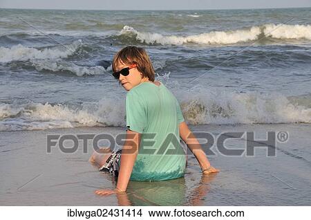 "Boy, 11 years, on the beach of Hua Hin, Thailand, Asia, PublicGround, Asia" View Large Photo Image Picture - "Boy, 11 years, on the beach of Hua Hin, Thailand, Asia, PublicGround, Asia". Fotosearch