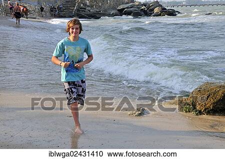 "Boy, 11 years, on the beach of Hua Hin, Thailand, Asia, PublicGround, Asia" View Large Photo Image Stock Image - "Boy, 11 years, on the beach of Hua Hin, Thailand, Asia, PublicGround, Asia". Fotosearch
