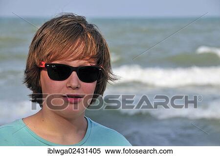 "Boy, 11 years, with sunglasses on the beach of Hua Hin, Thailand, Asia, PublicGround, Asia" View Large Photo Image Stock Photography - "Boy, 11 years, with sunglasses on the beach of Hua Hin, Thailand, Asia, PublicGround, Asia". Fotosearch