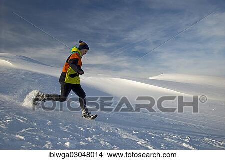 "Boy, 12, running through the snow, Gottesackerplateau, Kleinwalsertal, Vorarlberg, Austria, Europe" View Large Photo Image Picture - "Boy, 12, running through the snow, Gottesackerplateau, Kleinwalsertal, Vorarlberg, Austria, Europe". Fotosearch
