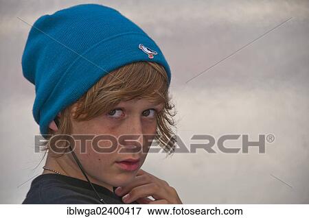 Stock Photo - "Boy, 12 years, with puzzled look on face portrait, Germany, Europe". Fotosearch