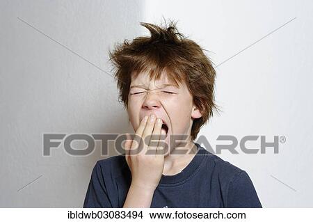 "Boy, 12 years, yawning, with tousled hair" View Large Photo Image Picture - "Boy, 12 years, yawning, with tousled hair". Fotosearch