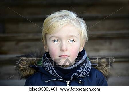 "Boy, 7 years, serious, portrait" View Large Photo Image Stock Image - "Boy, 7 years, serious, portrait". Fotosearch