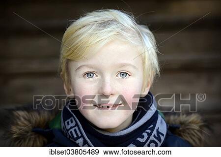 Stock Photo - "Boy, 7 years, smiling, portrait". Fotosearch