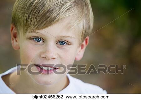 "Boy, 9 years old, portrait" View Large Photo Image Stock Image - "Boy, 9 years old, portrait". Fotosearch