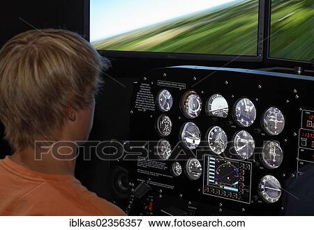 "Boy as a pilot in a Prop Cockpit Trainer, flight simulator, IdeenPark 2012, technology and education summit conference for young people, Essen, Ruhr area, North Rhine-Westphalia, Germany, Europe" View Large Photo Image Stock Photo - "Boy as a pilot in a Prop Cockpit Trainer, flight simulator, IdeenPark 2012, technology and education summit conference for young people, Essen, Ruhr area, North Rhine-Westphalia, Germany, Europe". Fotosearch