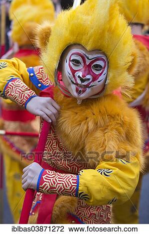 "Boy dressed as a yellow monkey, a traditional Beijing Opera or Peking Opera costume, Chinese New Year parade, London, England, United Kingdom, Europe" View Large Photo Image Stock Image - "Boy dressed as a yellow monkey, a traditional Beijing Opera or Peking Opera costume, Chinese New Year parade, London, England, United Kingdom, Europe". Fotosearch