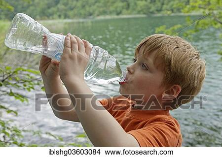 "Boy drinks water from a plastic bottle, Plitvice Lakes National Park, Croatia, Europe" View Large Photo Image Picture - "Boy drinks water from a plastic bottle, Plitvice Lakes National Park, Croatia, Europe". Fotosearch