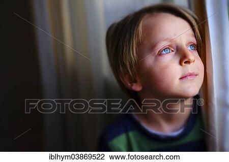Stock Image - "Boy, four years, dreamy look". Fotosearch