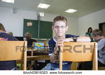 "Boy in an elementary school class, Reith im Alpbachtal, Kufstein district, Tyrol, Austria, Europe" View Large Photo Image Stock Image - "Boy in an elementary school class, Reith im Alpbachtal, Kufstein district, Tyrol, Austria, Europe". Fotosearch