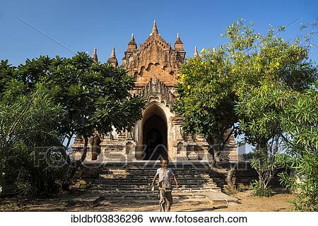 "Boy in front of a temple, stupa or pagoda in the temple complex of the Plateau of Bagan, Mandalay Division, Myanmar or Burma" View Large Photo Image Stock Photograph - "Boy in front of a temple, stupa or pagoda in the temple complex of the Plateau of Bagan, Mandalay Division, Myanmar or Burma". Fotosearch