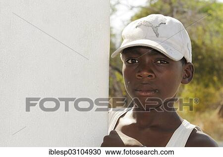 "Boy in the camp of Okaukuejo, Etosha National Park, Okaukuejo, Kunene Region, Namibia, Africa" View Large Photo Image Stock Image - "Boy in the camp of Okaukuejo, Etosha National Park, Okaukuejo, Kunene Region, Namibia, Africa". Fotosearch