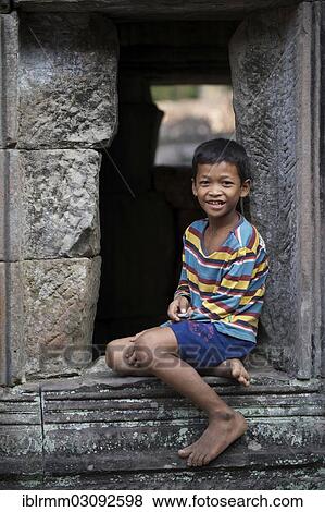 "Boy in the temple complex of Preah Khan or Prah Khan, Preah Khan, Siem Reap, Siem Reap Province, Cambodia, Asia" View Large Photo Image Stock Photo - "Boy in the temple complex of Preah Khan or Prah Khan, Preah Khan, Siem Reap, Siem Reap Province, Cambodia, Asia". Fotosearch