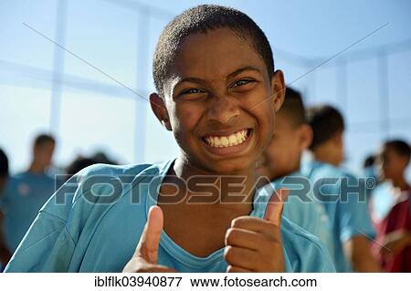 "Boy making thumbs-up gesture, Guararape favela, Rio de Janeiro, Brazil, South America" View Large Photo Image Stock Photo - "Boy making thumbs-up gesture, Guararape favela, Rio de Janeiro, Brazil, South America". Fotosearch